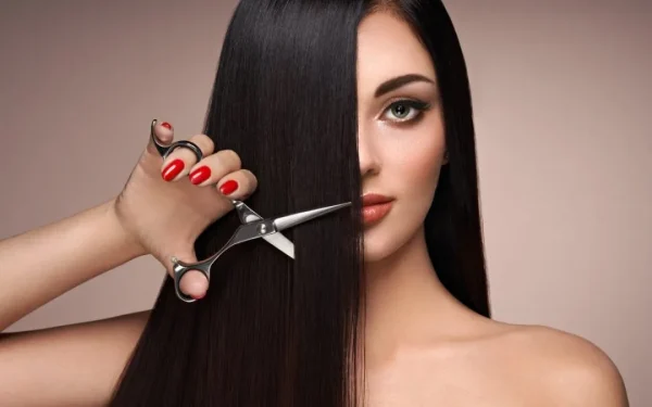 a-young-woman-cutting-her-hair-2021-08-28-11-56-36-utc-1080×675